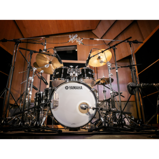 Yamaha Recording Custom Solid Black kit under studio microphones