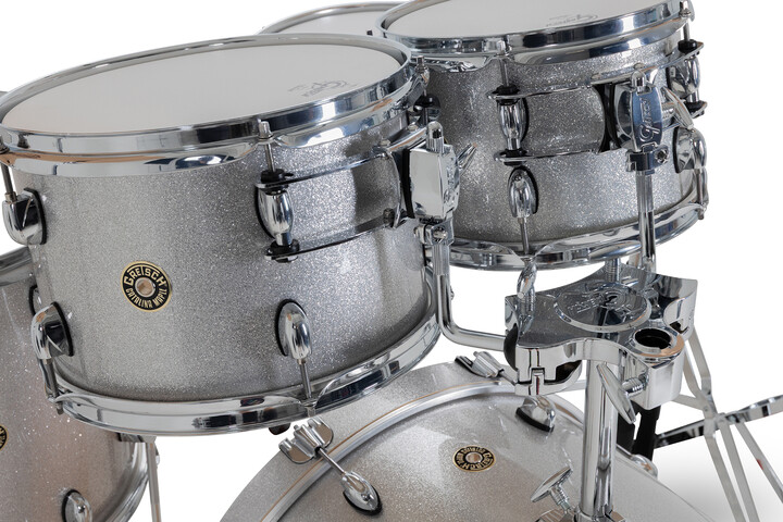 Gretsch Catalina Maple toms in Silver Sparkle with triple-flanged hoops and round badge