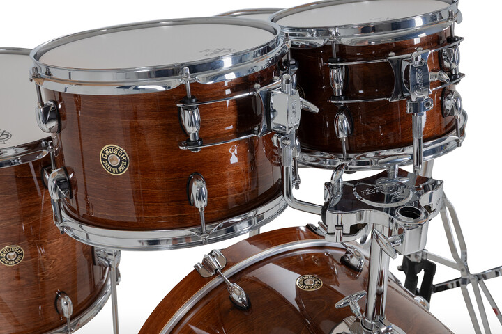 Gretsch Catalina Maple toms in Walnut Glaze with triple-flanged hoops and round badge