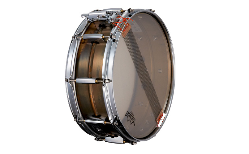 Pearl SensiTone Premium 1.5mm beaded patina-brass shell