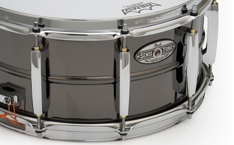 Pearl SensiTone Black Brass CL bridge lugs feature